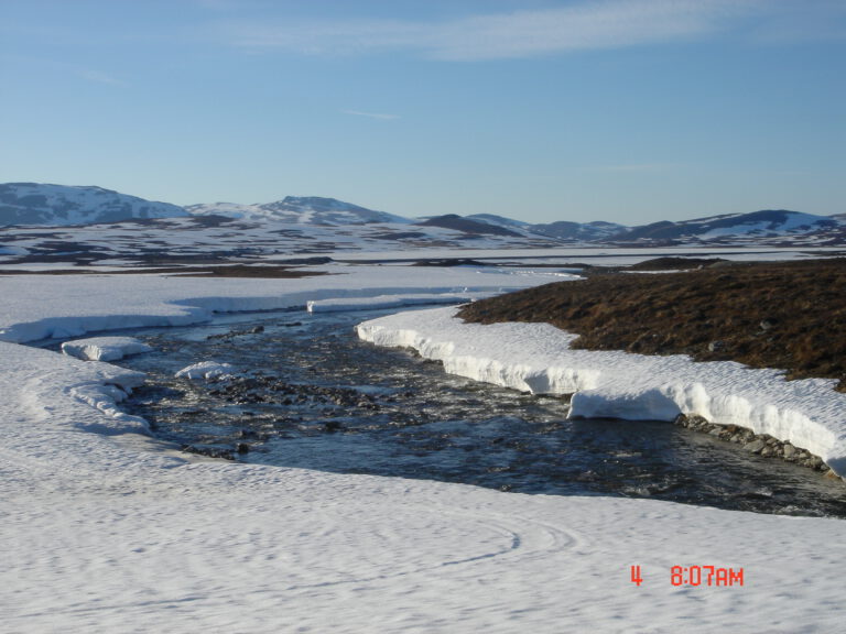 Snowy mountains and water